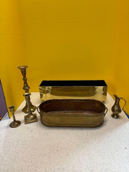 Two solid brass planters, 3 brass candlesticks, brass vase