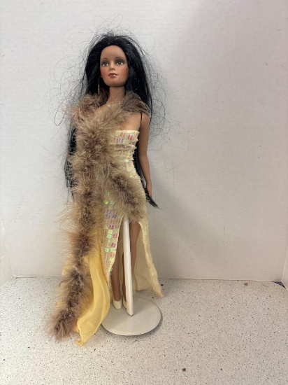 Vintage doll on stand