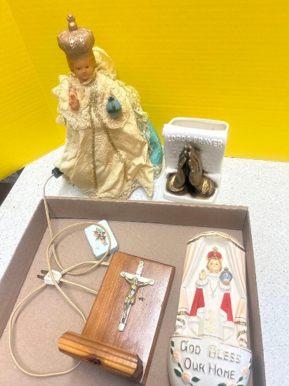 antique chalkware and cross decoration