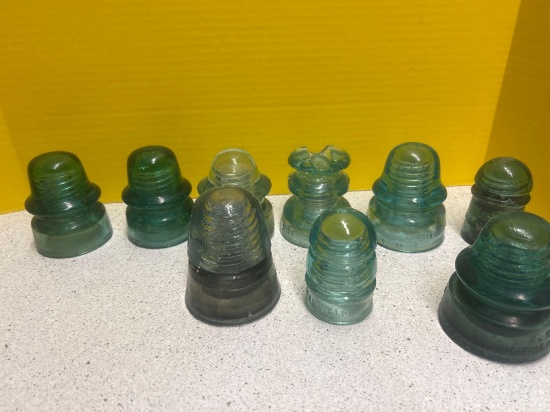 9 vintage glass insulators