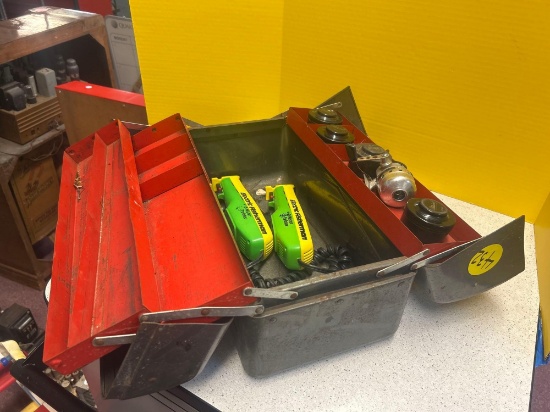 vintage metal tacklebox with reels and electric fisherman