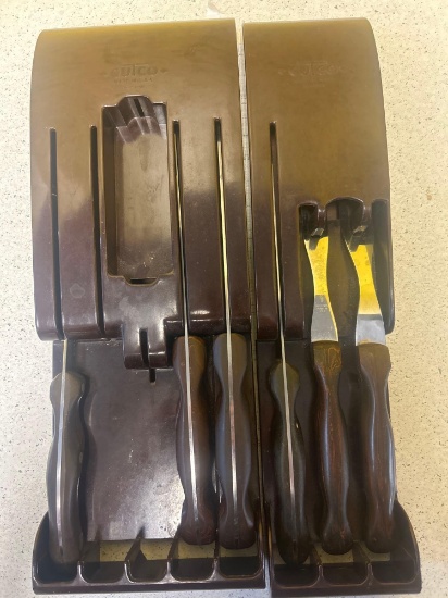 CUTCO utensils in 2 cases. Four knives, two forks.