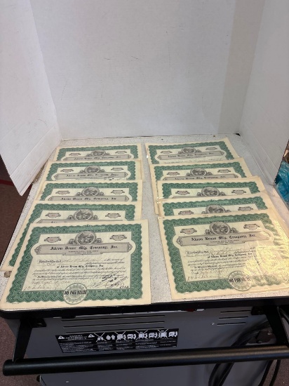 12 stock certificates, Akron brass company