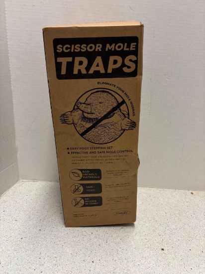 Scissor mole traps