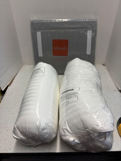 Sheet organizer and two down alternative queen size pillows