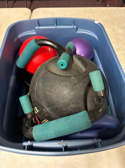 Tote full of exercise equipment