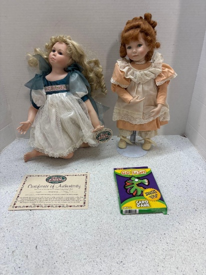 2 porcelain dolls and a go fish card game