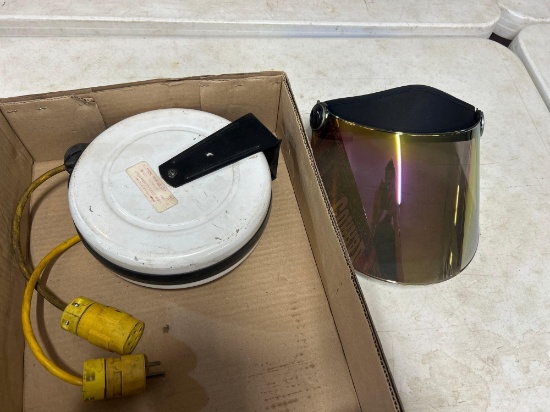 Face shield, and retractable drop light
