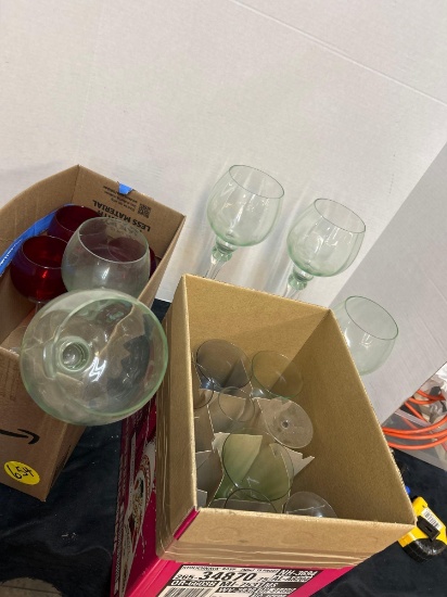 various taller and shorter wine glasses/ globe vases