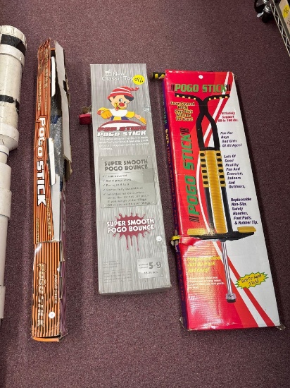 three pogo sticks