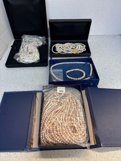 Four sets of cultured pearls, one with bracelet