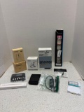 Phone chargers, cordless mouse, shower phone holder, etc.