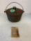 Three legged cast-iron Dutch oven