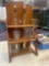 vintage wooden bottle shelf with crystal glass
