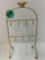 antique jewelry stand with wooden carved decor