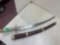 short sword, etched blade, metal guard and handle
