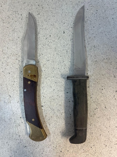Buck 105 USA hunting knife 9 1/4 inches long and SCHRADE Uncle Henry LB7 folding knife 8 3/4 inches