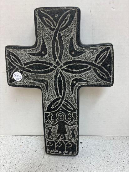 Carved stone crucifix