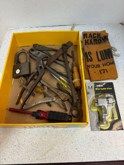 Old hand tools, and big brass lock