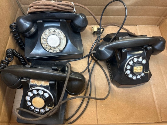 three vintage telephones