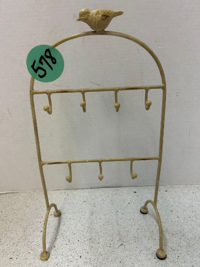antique jewelry stand with wooden carved decor