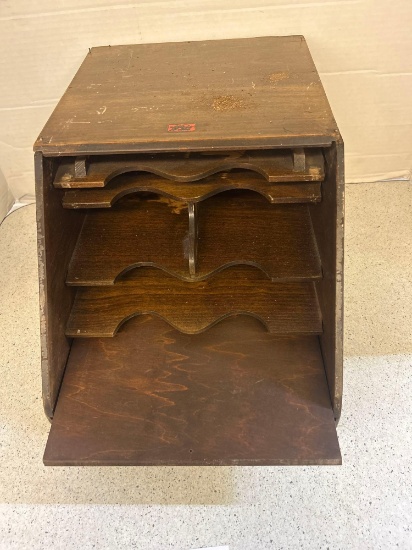 slant front wooden box with shelves