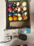 vintage pool balls and Minolta flash gun