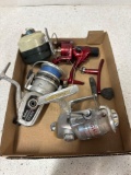 Four fishing reels