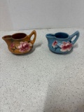 Two Roseville pottery creamers