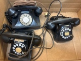 three vintage telephones