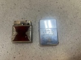 zippo cigarette lighter with advertising and ornate Lunder 1000 lighter with engraving