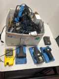 large box of GFG charging cradles and electronics