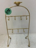 antique jewelry stand with wooden carved decor