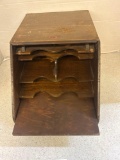 slant front wooden box with shelves