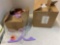 box of folding hangers and crab toilet paper holder