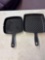 Two cast-iron skillets, HEUCK classics and Food Network