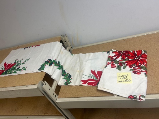 two vintage Christmas table cloths