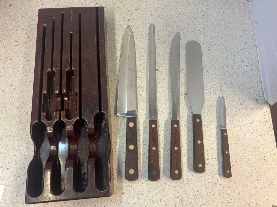 cutco utensils in fitted block
