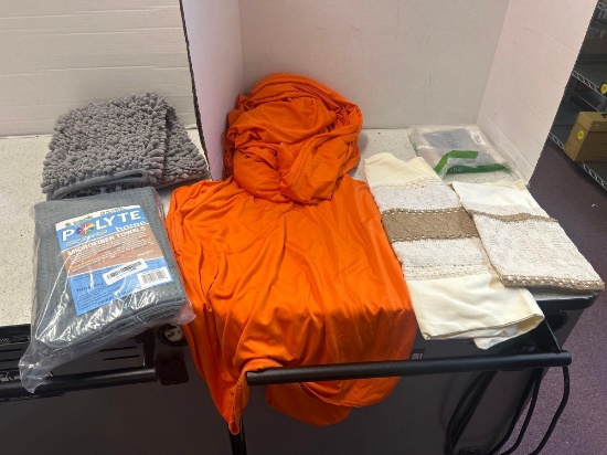 New microfiber towels, table runners and bright orange covers