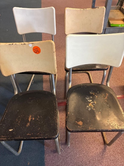 Four vintage all metal chairs