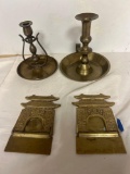 Korean temple brass bookends, and two brass candleholders