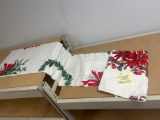 two vintage Christmas table cloths