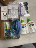 CETAPHIL lotion, wireless earphones, wax warmer