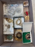jewelry and World War II freedom medal