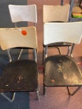 Four vintage all metal chairs