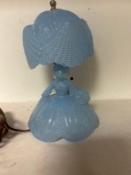 vintage light blue glass lady lamp