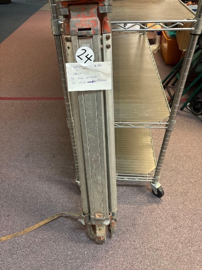 Vintage metal tripod about 40 inches compressed