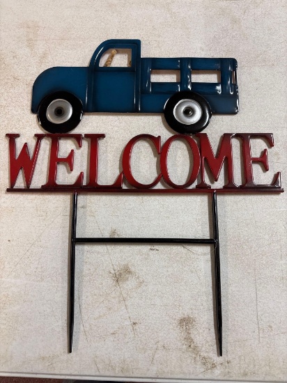 Six new welcome signs with pick up truck