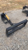 UNUSED MID-STATE BACKHOE;