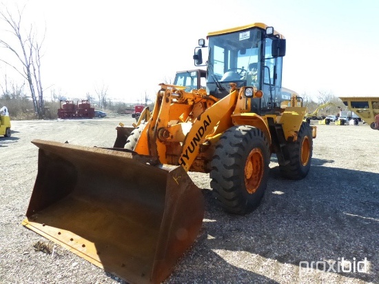 2009 HYUNDAI HL730-7A RUBBER TIRE LOADER;